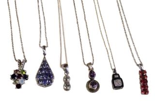 A collection of six 925 silver gem-set pendant necklaces comprising a multi-gem cluster pendant