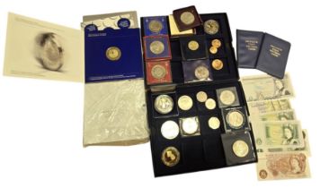 Collection of British and Commonwealth coins and banknotes, including a silver proof commemorative