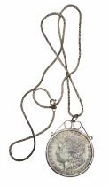 A late 19th century American Morgan dollar pendant necklace, 1887. The pendant formed from an 1887