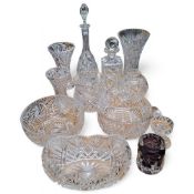 Glassware - a cut glass whisky decanter; a slender necked wine decanter; a cut glass water jugs;