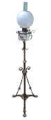 A late 19th century Gothic Revival adjustable floor standing oil lamp, frosted globular shade, clear