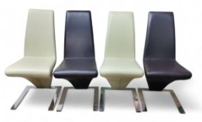 A set of four contemporary Demi-Z dining chairs, two cream, two tan, faux leather,  chrome legs