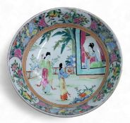 A Chinese famille rose, the interior of the bowl in coloured enamels with figure at a window and
