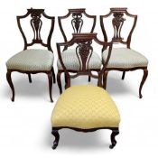 A set of three late 19th century  mahogany salon side chairs, shield shaped backs, pierced vasular