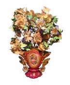 A French Paris rococo vase, painted with flowers in colours on a pink ground, picked out in gilt,