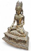 Thai/Burmese School, a bronzed Buddha, seated in meditation,  24cm high