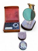 A reproduction desktop magnifier, label for Watkins & Hill, Optirians,  London 1805, 28cm high;   an