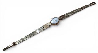 A 9ct gold Rotary lady's watch, Swiss 17 jewel movement, silvered marquise shaped dial, baton