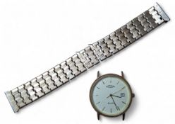 A 9ct gold Rotary Elite gentleman's wristwatch, quartz movement, champagne dial, gold coloured baton