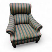 A Victorian easy armchair, in the manner of Howard & Sons, stuffed-over upholstery,  turned