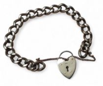 A 9ct gold curb link bracelet, heart shaped padlock, 29.4g