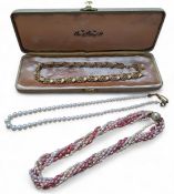 A boxed Ciro of Bond Street yellow metal, necklace links in the forms of leaves and set with a