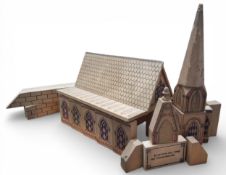 An unusual religious wooden building blocks, forming a church, each window block having a proverb to