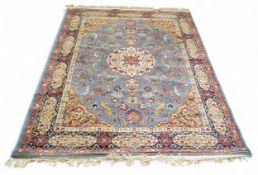 A Woodward Grosvenor  & Co Lansdowne Wilton 'Persian' woollen rug, with central medallion and floral