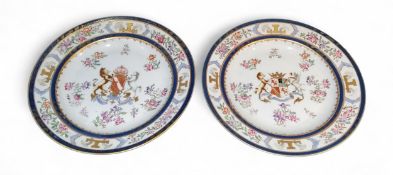 A pair of French Armorial porcelain plates, painted in the Chinese export  manner,  crested, the