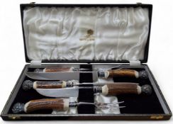 A Mappin & Webb Trustworthy stag horn handled five piece carving set, stainless steel blades,
