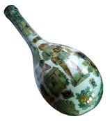 A Victorian decalcomania glass bottle, decorated with polychrome printed decoupage scraps, 30cm