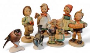 A Goebel figure, designed by M J Hummel, Mother's Darling, printed mark;  others;   a Goebel