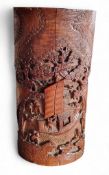 A Chinese bamboo brush pot, carved with sampan, pine trees and figures, 25.5cm high, late 19th/early