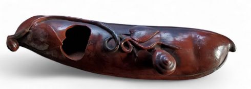 A Japanese ceramic bean/pea pod  wall pocket/vase,  with snail and foliage, 27cm long, Meiji