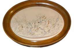 Justin Mathieu, an oval high relief plaque of a Crusaders battle, oak frame, 31cm x 41cm Justin