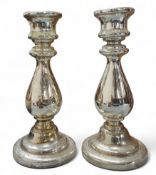 A pair of Victorian  mercury silvered candlesticks, baluster columns, spreading circular bases, 25cm