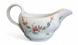 A rare Bristol ogee sauceboat,  leafy scrolls, moulded in relief with painted with a floral swags