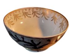 A large English porcelain bowl, possibly John Rose Coalport, decorated in cobalt blue and gilt
