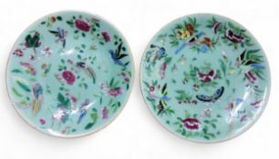 A late 19th century Chinese Cantonese circular plate, with peonies, fanciful birds, butterflies,