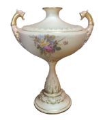 A Royal Worcester two handled pedestal vase, printed and painted with roses and foliage, outlined in