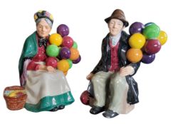 A pair of Royal Doulton figures, The Balloon Man, HN1954 and The Old Balloon Seller, HN1315 (2)