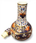 A Derby bottle vase and cover, decorated in the Imari palette, 25cm high, crown, crossed batons