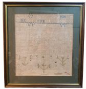 A George IV needlework sampler, embroidered with the alphabet, and stylised flowers, dated 1821,