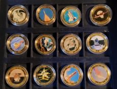 A set of twelve Westminster Mint enamelled Cook Island 1 Dollars, One Small Step 1969-2009, each