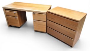 An Ikea office desk, with drawers, 73cm high, 65cm deep, 140cm wide;  an Ikea chest, of three long