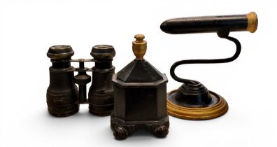 An early 19th century steel goffering/tally iron, circular base, 15cm high, c.1850;   a 19th century