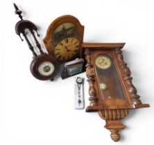 A 19th century Vienna walnut wall clock, 15cm diam,  Roman numerals, turned columns, fluted and