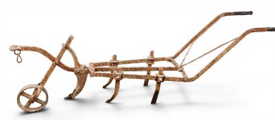 Rural Art - an iron Garrett's patent hand plough, 248cm long