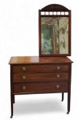 An early 20th century mahogany chest, of two long graduated drawers, barber pole stringing, tapering