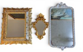 A Dutch Baroque style rectangular mirror/looking glass, cushion frame, the rectangular plate within