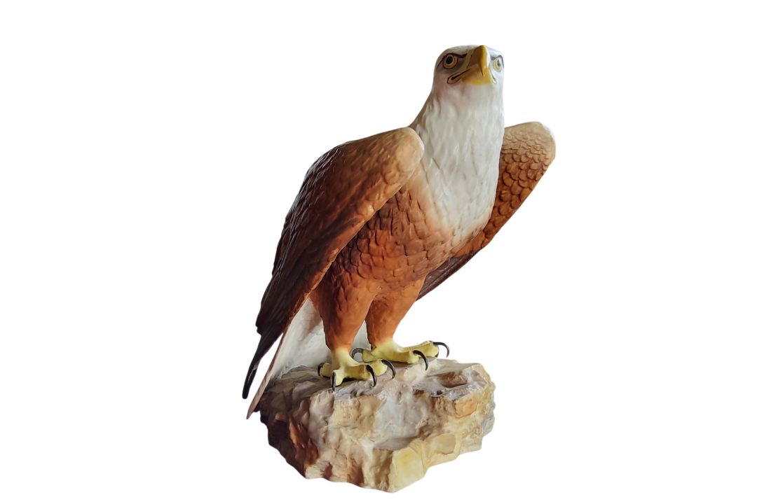 A Royal Crown Derby model, Eagle, naturalistically modelled, on a rock, 25.5cm high, printed mark in - Image 1 of 2