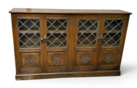 A 20th century Webber Furniture Company oak door bookcase, leaded astragal glazed doors, each with