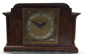 An Elliott of London, walnut mantel clock, dial (retailers stamp HL Brown & Son Ltd of Sheffield)