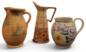 A Bursley Ware Stitch spreading cylindrical jug, designed by Charlotte Rhead, tube lined with