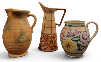 A Bursley Ware Stitch spreading cylindrical jug, designed by Charlotte Rhead, tube lined with