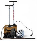 A picnic basket;   Levenhuk 8x 21 binoculars;   others;    Bontrager bike pump;   another;  etc