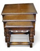 A nest of three oak rectangular tables, turned legs, block stretchers, 50cm - 46cm high, 56cm - 38cm