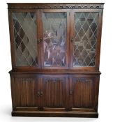 A Jaycee type  furniture oak side cabinet, the top with three astragal glazed doors, the