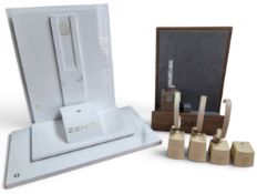 Watch interest - three Rolex watch stands with c rings; a Rolex watch stand base; an Oris watch