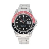 ROLEX, A GMT-MASTER ‘COKE’ WRISTWATCH, ref. 16700, S serial, circa 1993, in stainless steel, the